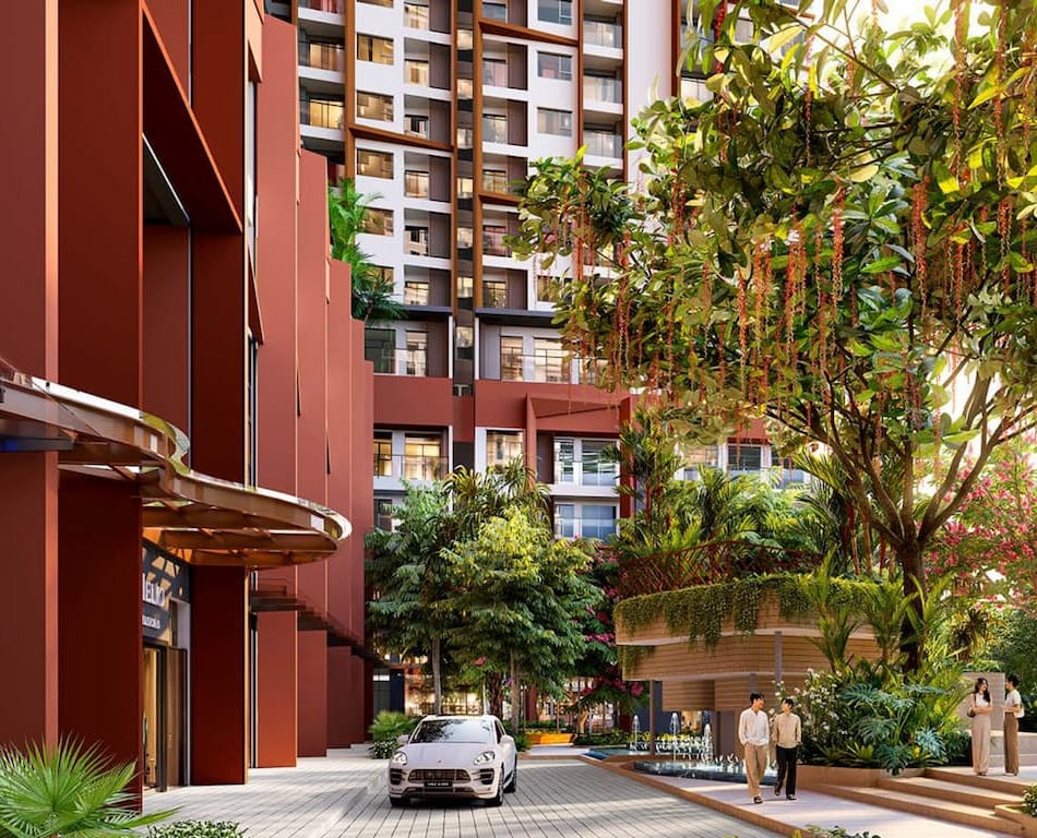 SkySOLIS arrival drop-off with a cascading green wall on the red podium