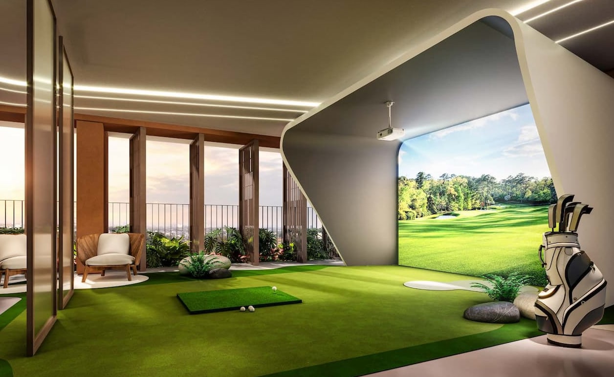 Indoor golf simulator lounge at SkySOLIS with a putting green and city terrace