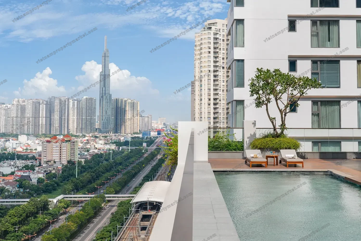 The Berkley rooftop pool over the Saigon skyline