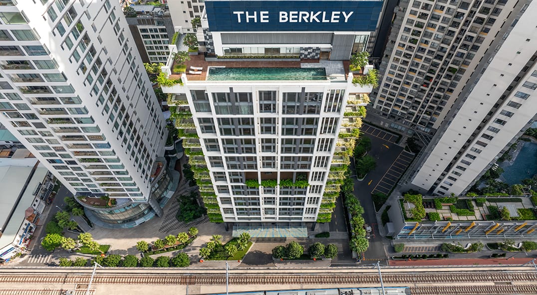 The Berkley — aerial view over the rooftop pool and metro line